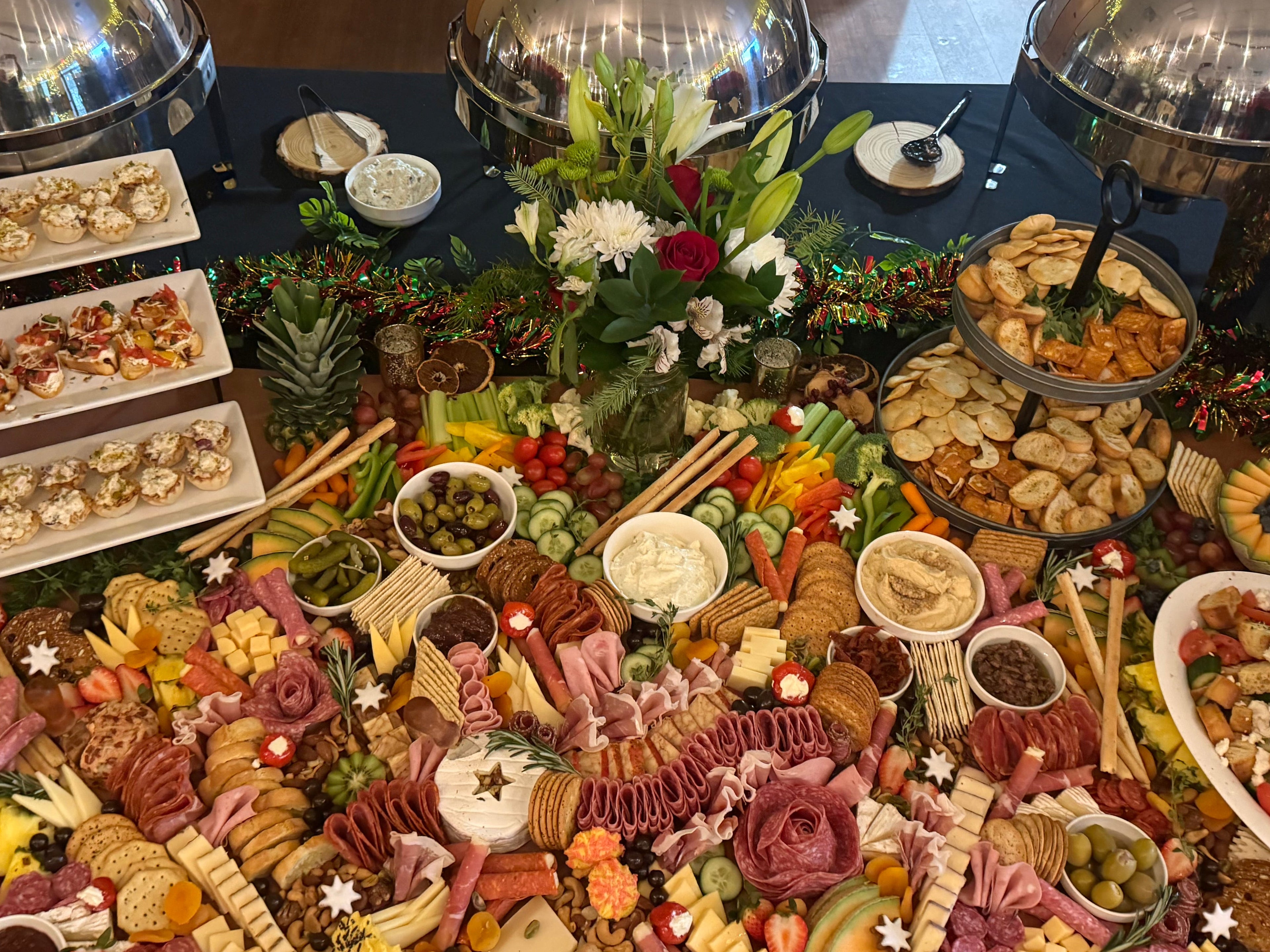 Diverse array of food items on a table with decorative elements